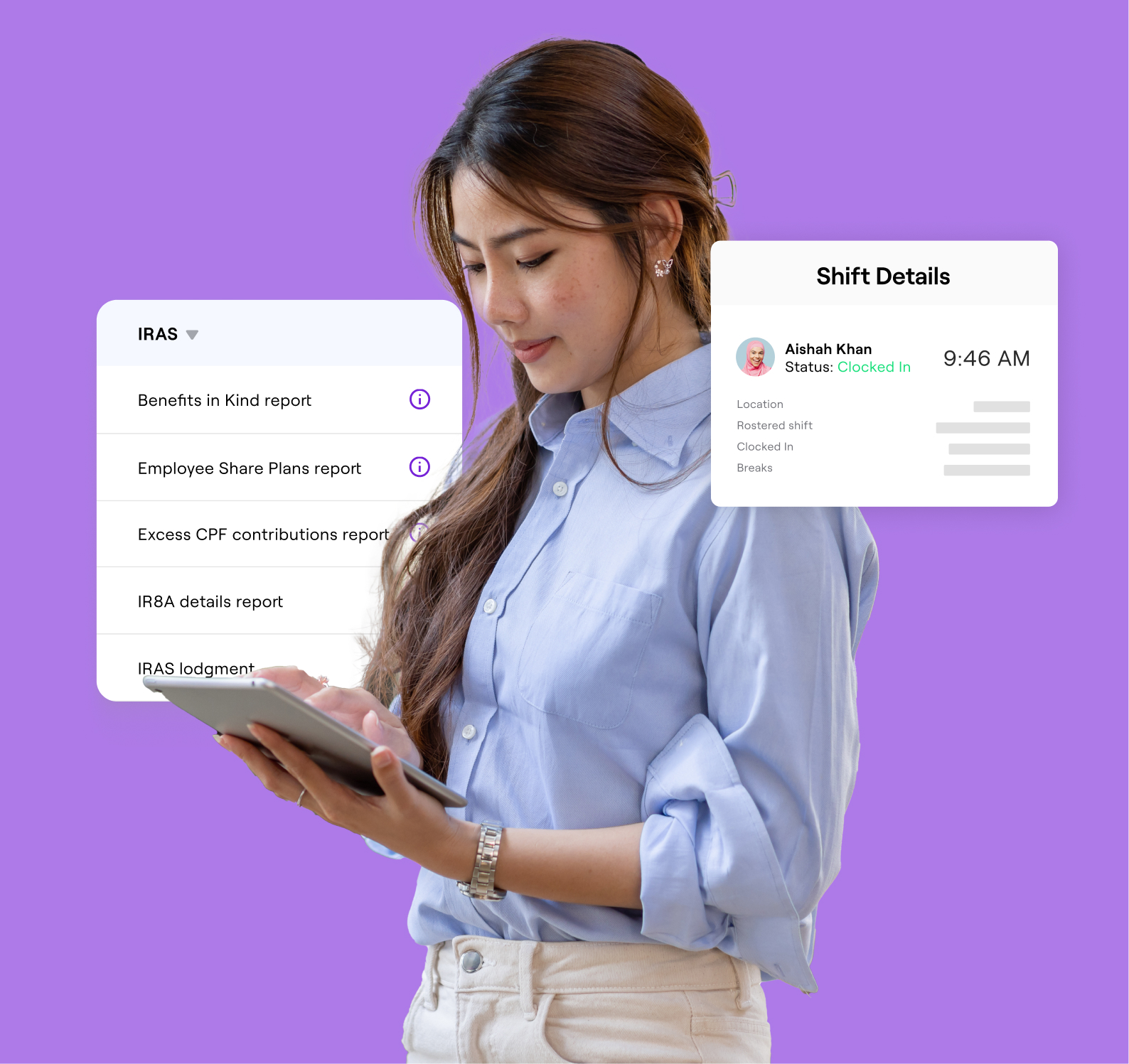 A woman standing while browsing on her tablet.