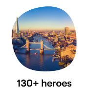 An aerial view of London featuring the iconic Tower Bridge and the River Thames, with the city's skyline bathed in golden light An aerial view of London featuring the iconic Tower Bridge and the River Thames, with the city's skyline bathed in golden light