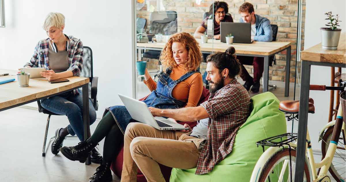 people in a tech startup working