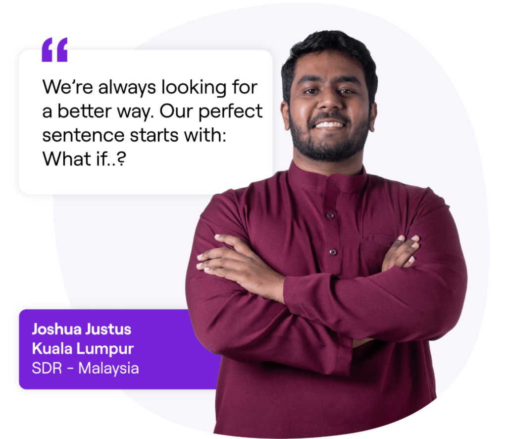 Smiling man wearing a red top, standing with folded arms. Next to him is a quote that reads: 'We’re always looking for a better way. Our perfect sentence starts with: What if..?' Text box below reads: 'Joshua Justus, Kuala Lumpur, SDR - Malaysia.'